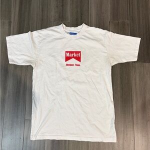 MARKET MENS ADVENTURE TEAM SS WHITE TEE SIZE MEDIUM